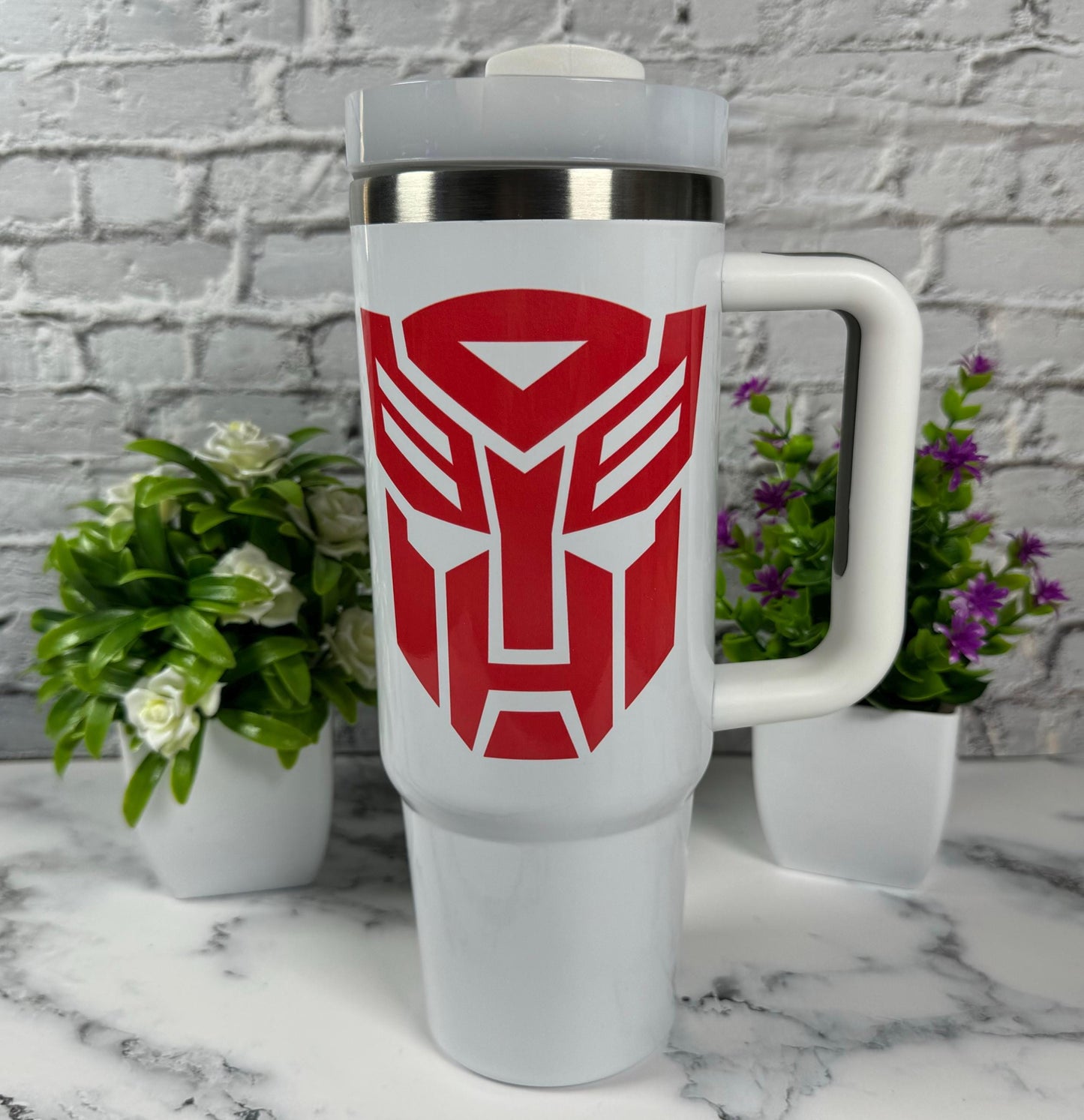 40oz Cartoon Tumbler Retro 80s Stanley Dupe Show off your fandom with this sleek and durable tumbler. Perfect for staying hydrated in style!