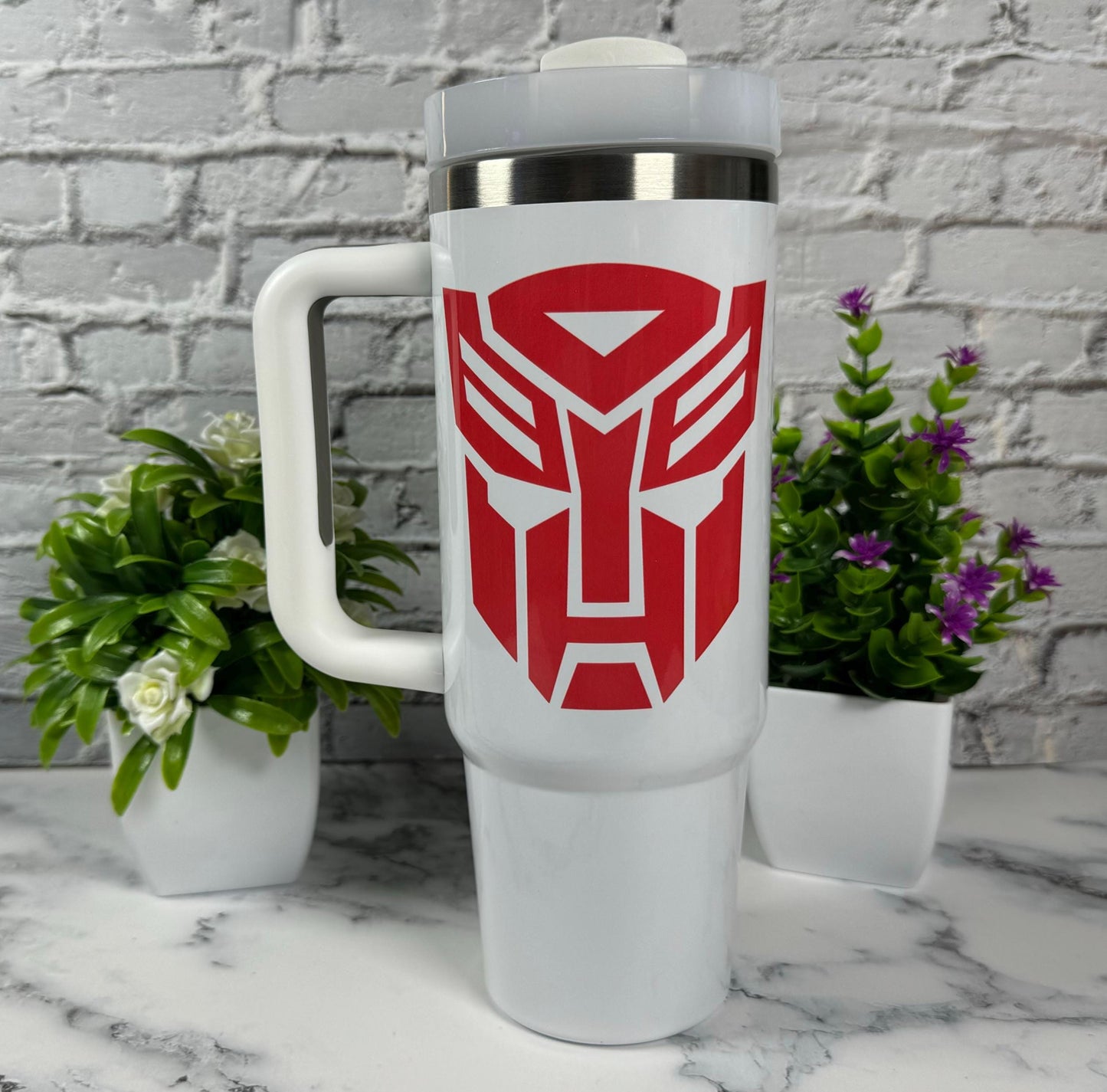 40oz Cartoon Tumbler Retro 80s Stanley Dupe Show off your fandom with this sleek and durable tumbler. Perfect for staying hydrated in style!